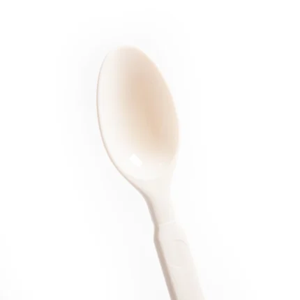 reusable plastic spoon in color cream