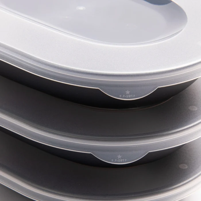 Large oval transparent food bowl lid stacked